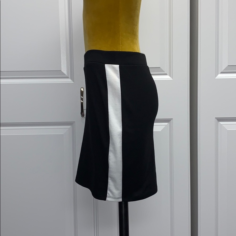 Forever 21 black with white stripe mini skirt.